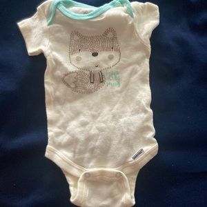 Carter’s newborn onesie “brave wild strong”